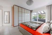 Eltern EG Junges, exklusives Einfamilienhaus mit Traumgarten in exponierter, gesuchter Randlage