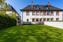 R�ckansicht Voll vermietetes 3-Familienhaus in Top-Lage