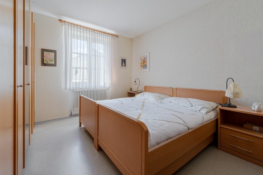 1.OG Schlafzimmer Mehrfamilienhaus Deidesheim